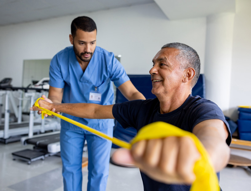 man-doing-physical-therapy-exercises-using-a-stretch-band